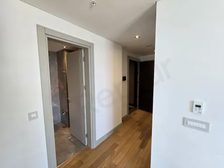Spacious and bright living room area of a modern residence apartment in Sisli, Istanbul.
