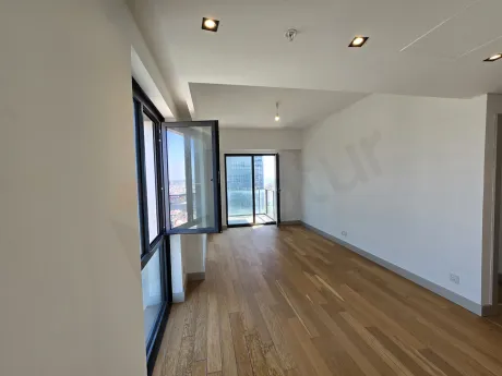 General view of a spacious and airy living room with modern design.