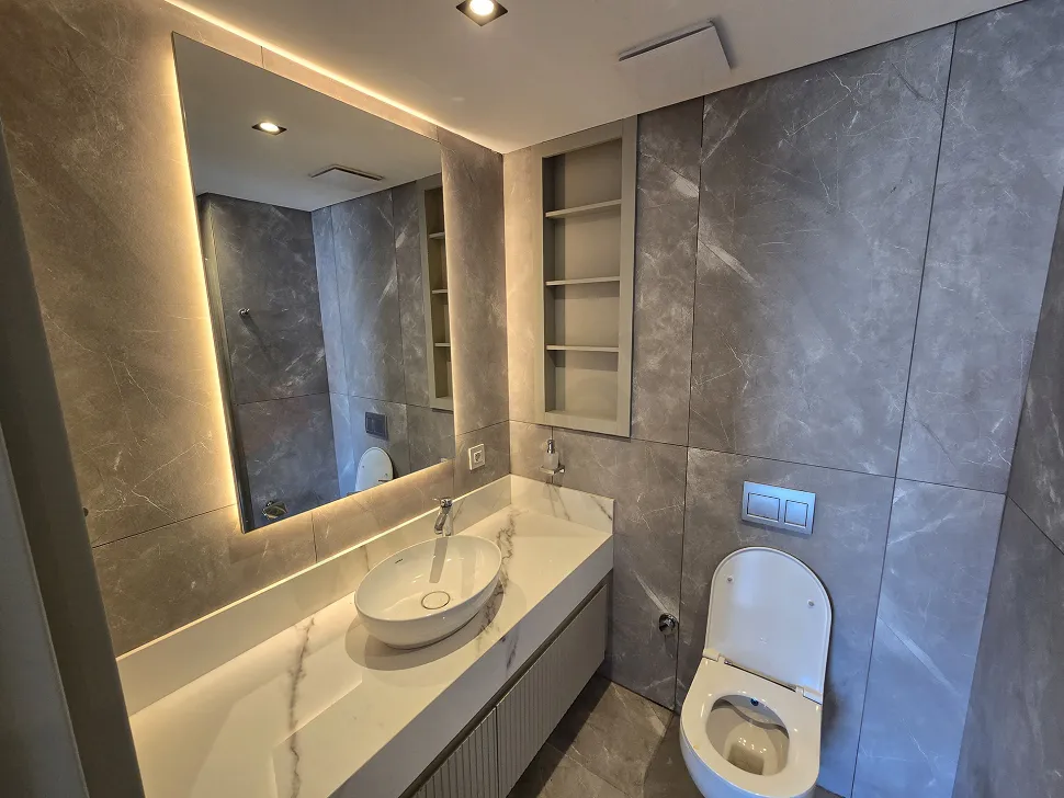 Modern design bathroom interior with stylish fixtures.