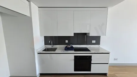 Spacious and bright kitchen area of a modern residence apartment in Sisli.