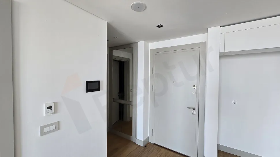 Elegant interior staircase design in a modern residential apartment.