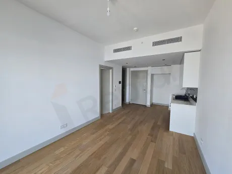 Spacious and bright living room area with a modern design.