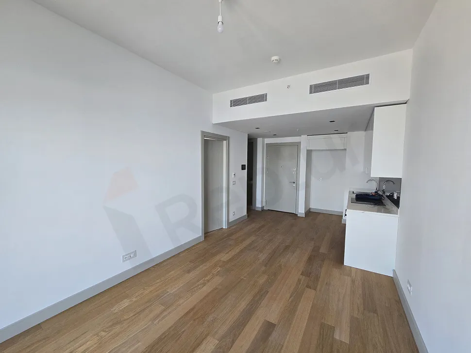 Spacious and bright living room area with a modern design.