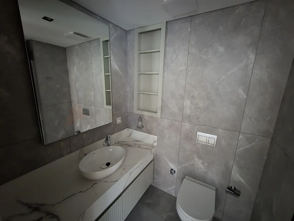 A stylish bathroom interior with modern design, high-quality ceramics, and sanitary ware.