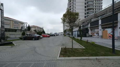 Spacious and modern outdoor parking area with electric vehicle charging stations.