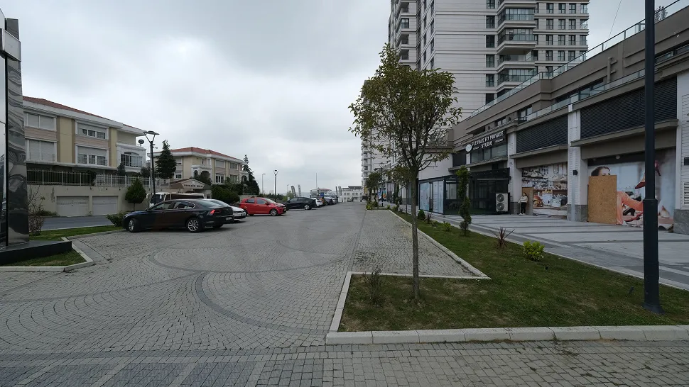 Spacious and modern outdoor parking area with electric vehicle charging stations.