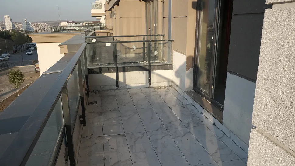 View of a balcony area in a modern commercial building in Basaksehir.