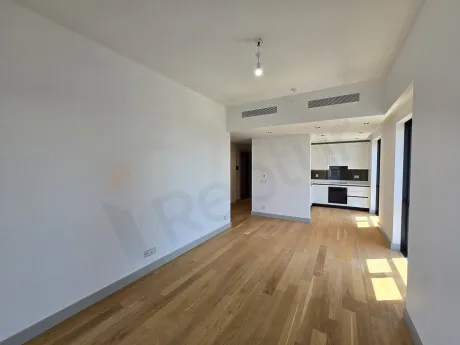 Bright empty living room with modern architecture, large windows and city view in Sisli.