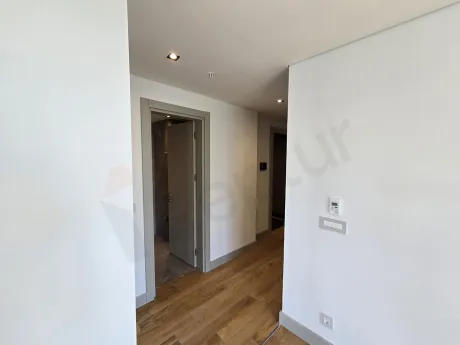 Spacious and bright corridor view of a modern residence apartment.