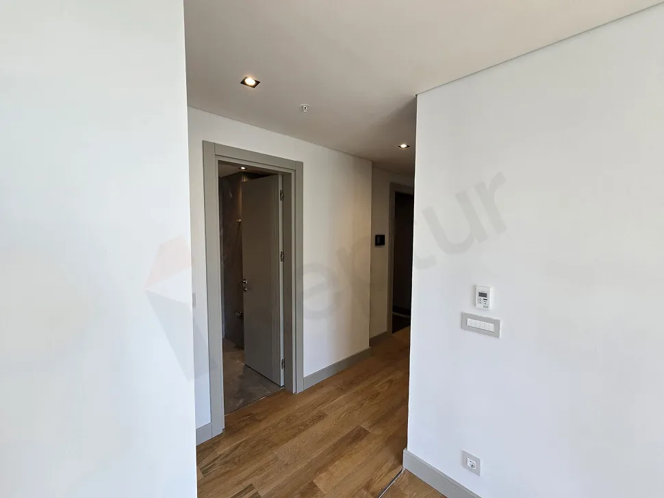 Spacious and bright corridor view of a modern residence apartment.