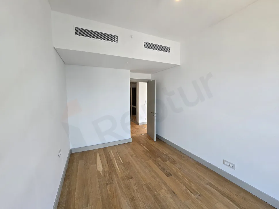 Bright and spacious bedroom area of a modern residence apartment in Sisli.