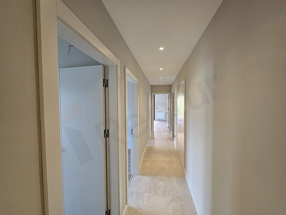 Modern apartment corridor interior design, wooden floor and white walls