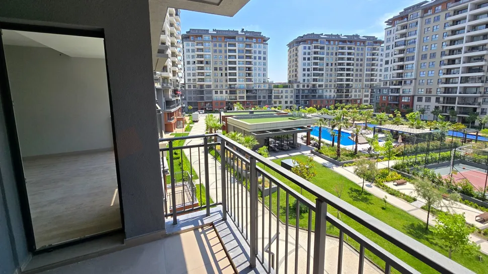 Resort-Style Vista: Spacious 4+1 Residence with Dual Balconies Overlooking the Pool