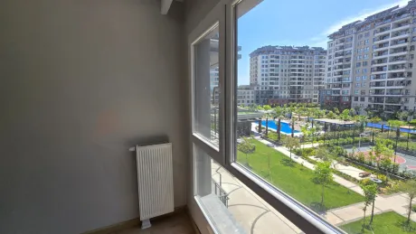Resort-Style Vista: Spacious 4+1 Residence with Dual Balconies Overlooking the Pool