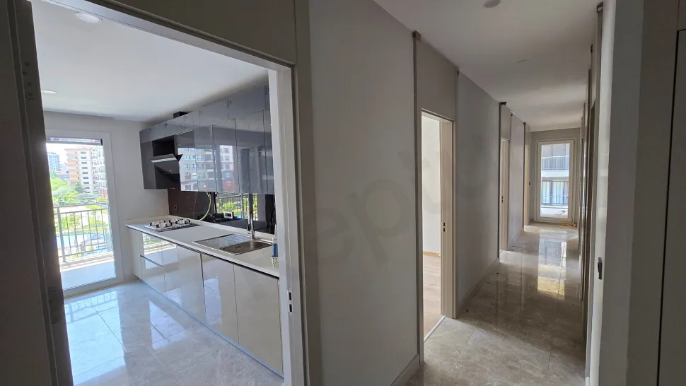 Resort-Style Vista: Spacious 4+1 Residence with Dual Balconies Overlooking the Pool