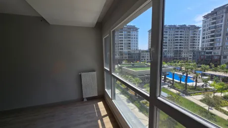 Resort-Style Vista: Spacious 4+1 Residence with Dual Balconies Overlooking the Pool