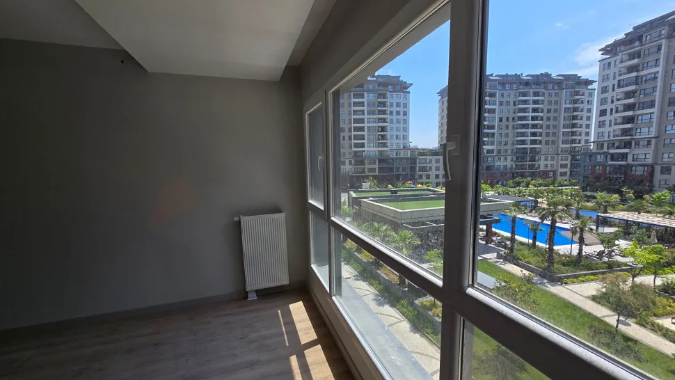 Resort-Style Vista: Spacious 4+1 Residence with Dual Balconies Overlooking the Pool