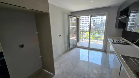 Resort-Style Vista: Spacious 4+1 Residence with Dual Balconies Overlooking the Pool