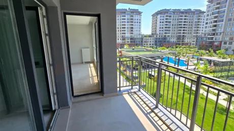 Resort-Style Vista: Spacious 4+1 Residence with Dual Balconies Overlooking the Pool