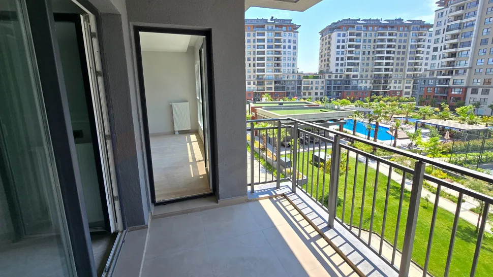 Resort-Style Vista: Spacious 4+1 Residence with Dual Balconies Overlooking the Pool
