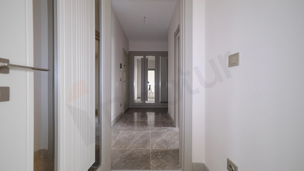 Photograph of a bright and spacious corridor.