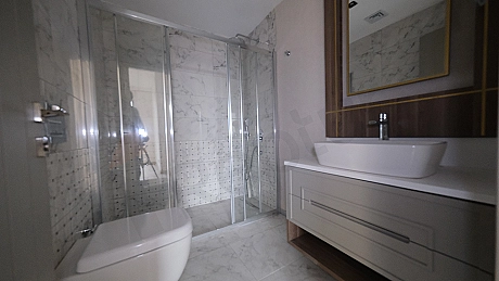 A bright and spacious bathroom with a modern design.