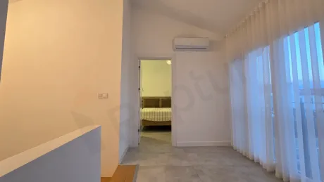 Spacious and bright furnished hallway view of a modern villa