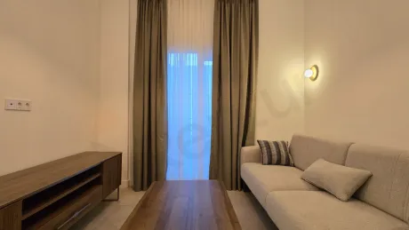 Spacious living room with modern and stylish furniture in a 3+1 villa for sale in Milas, Mugla.