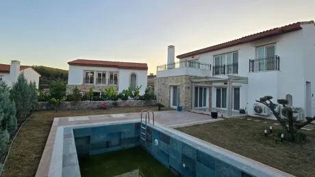 Exterior view of a modern 3+1 detached villa architecture in daylight.