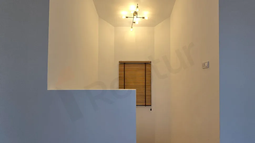 Spacious, bright, and airy hallway area of a modern villa.