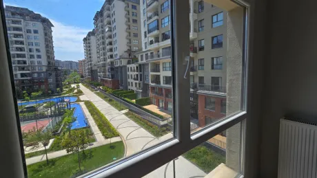 Resort-Style Vista: Spacious 4+1 Residence with Dual Balconies Overlooking the Pool