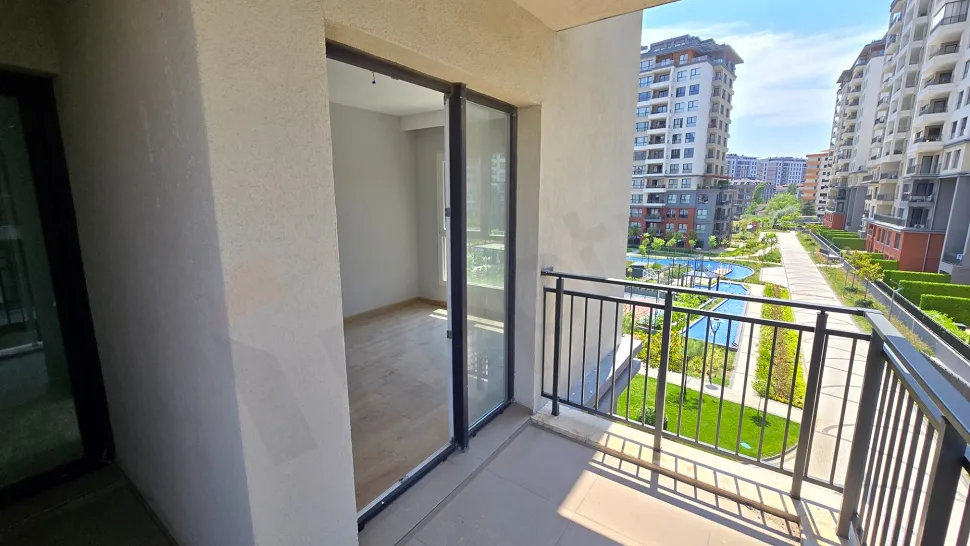 Resort-Style Vista: Spacious 4+1 Residence with Dual Balconies Overlooking the Pool