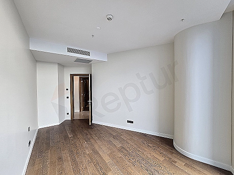 Modern bedroom interior, spacious window, wooden floor and minimalist design.