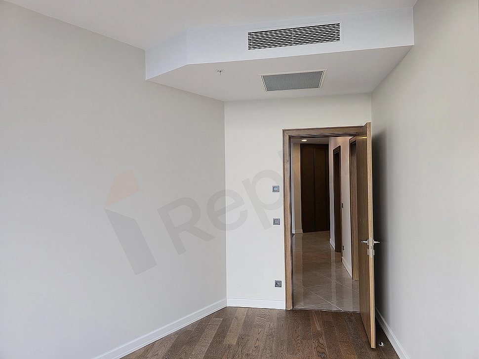 Modern bedroom interior, wide double bed, wooden bedside tables, stylish lampshades and large window