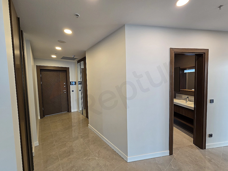 Modern apartment entrance door and lighting detail.