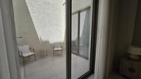 Modern open-top inner garden terrace area of the villa.