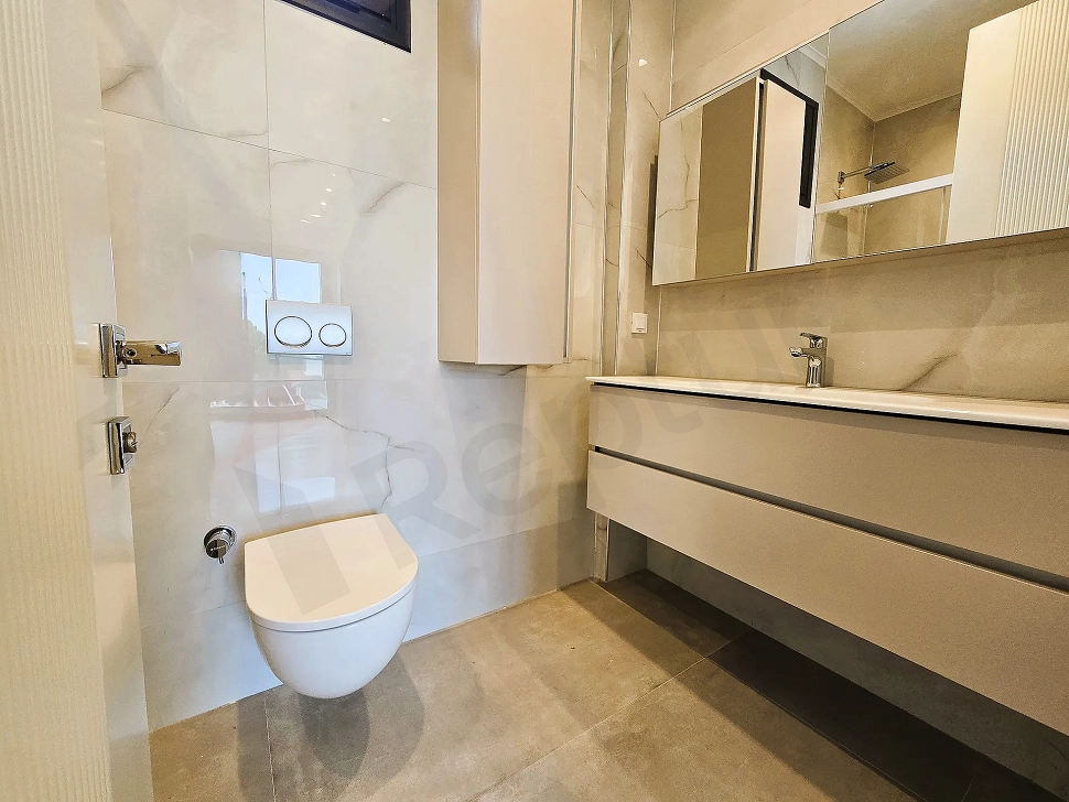 Modernly designed, spacious, and bright bathroom area of the hotel project in Bodrum.