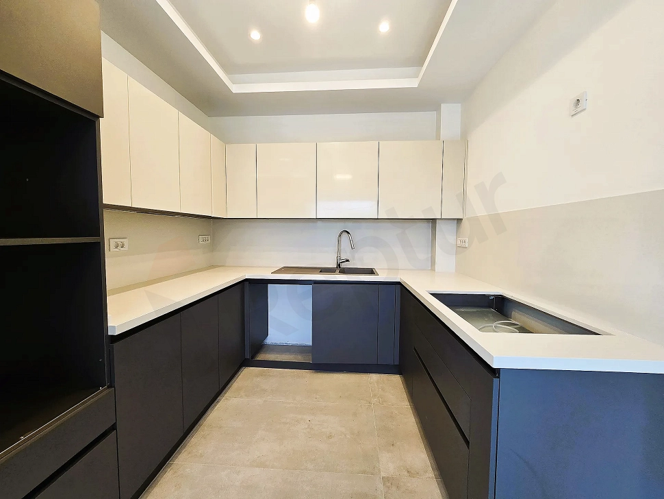 Modern designed, spacious and bright hotel kitchen area.