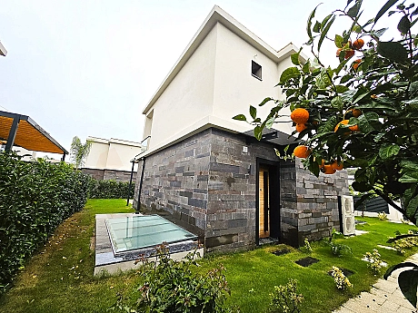 Landscaped spacious and green garden area of the hotel for sale in Bodrum.