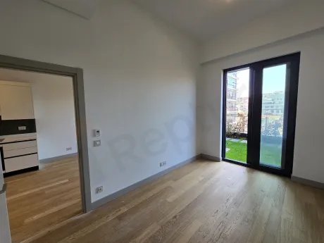 Modern, spacious, and sunlit bedroom area of a luxury residence apartment in Sisli.