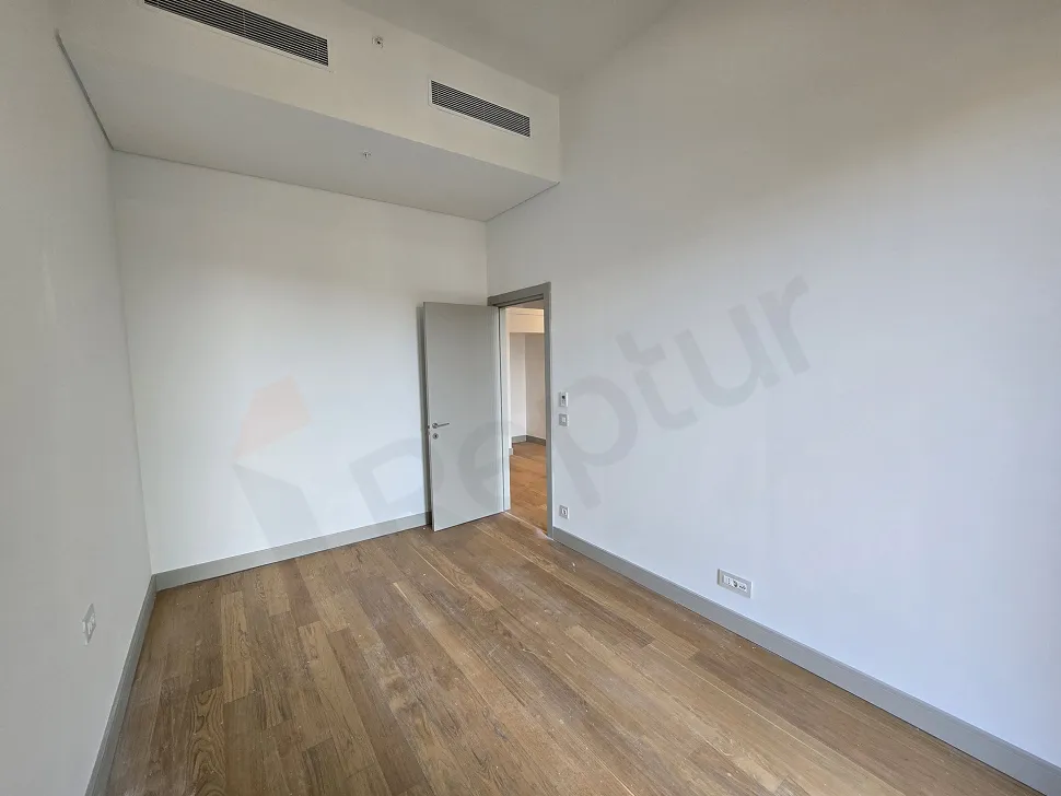 Bright and spacious bedroom area of a modern residence apartment in Sisli.