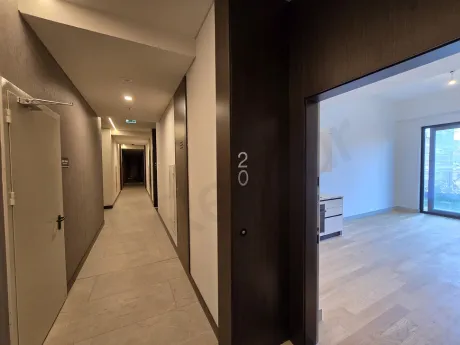 Bright and spacious corridor view of a modern residence in Sisli.