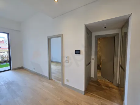 Modern internal staircase design within a residential apartment.