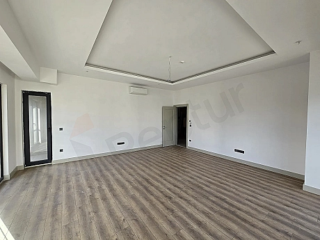 Photo of a bright living room.