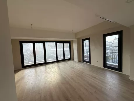 Spacious and modern living room area of a 3+1 apartment in Cekmekoy.