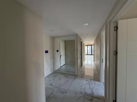 Bright corridor view of a modern and spacious apartment