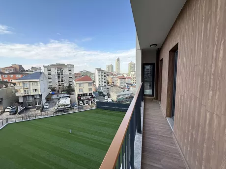 Large and spacious balcony of a modern apartment.