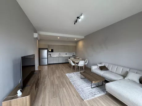 A spacious and bright living room image furnished with modern furniture.