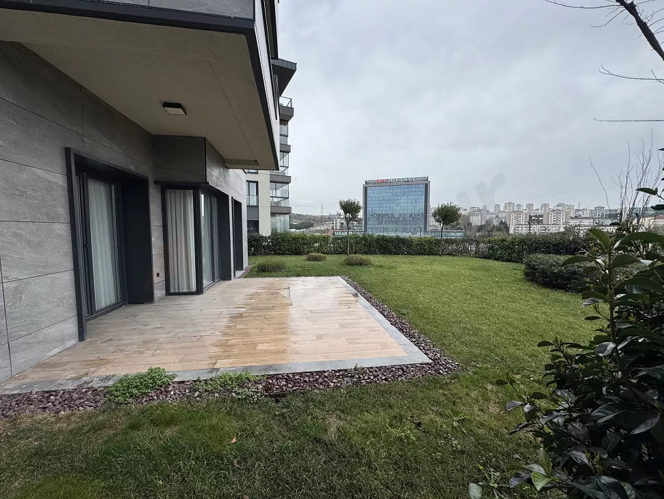 Spacious terrace area furnished with modern outdoor furniture