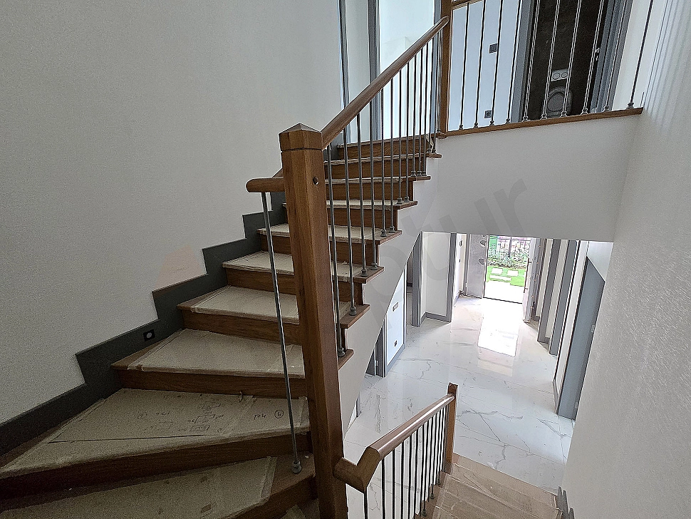 Interior view of a corridor in an unfurnished villa for sale in Başakşehir.